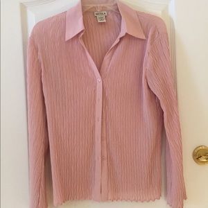 Pretty pink blouse with nice design. Size M.